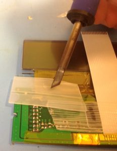 Repairing LCD with missing lines using soldering iron